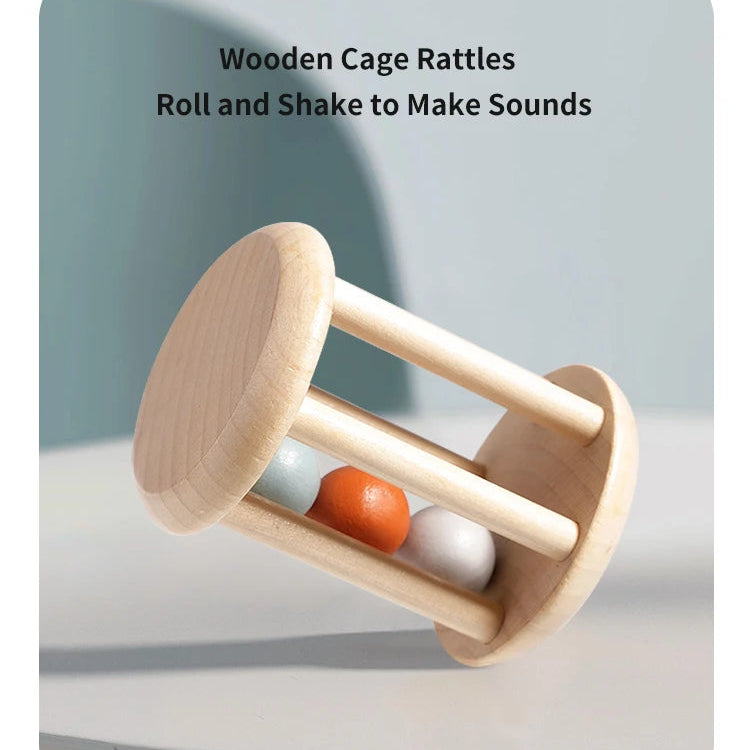 Wooden cage rattle with beads on a light gray background