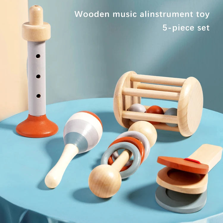 Set of wooden musical instruments on a blue surface with a light blue background